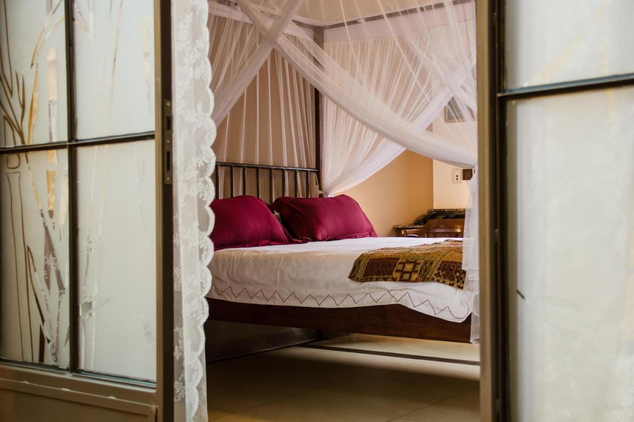 Hotel Bougainviller Кампала Экстерьер фото