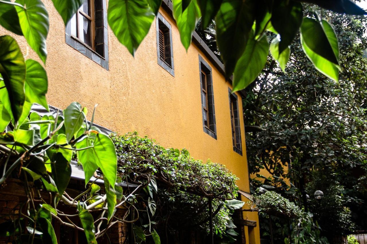 Hotel Bougainviller Кампала Экстерьер фото